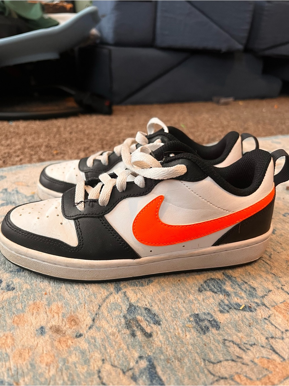 Nike Kids Low-Top Sneakers in White, Black & Bright Orange Swoosh